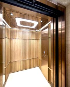 Car lift design: Teak wood stainless rose gold ตกแต่งลิฟต์